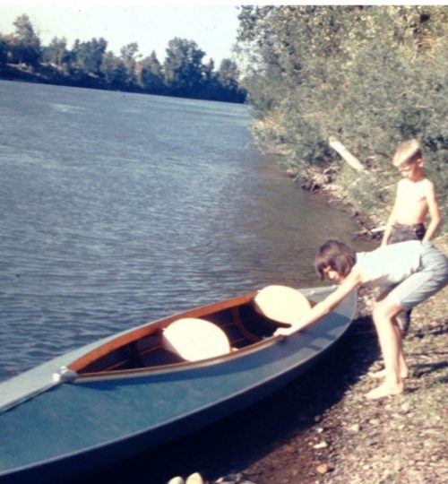 Canvas covered wood frame tandem kayak-foldboat. Willamette River, 1965